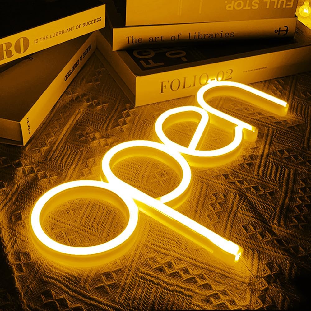 bukas - iluminado LED neon sign na nakasabit sa dingding